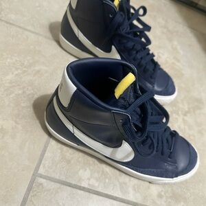 Nike Navy High-Top Sneakers with White Swoosh and Yellow Tongue